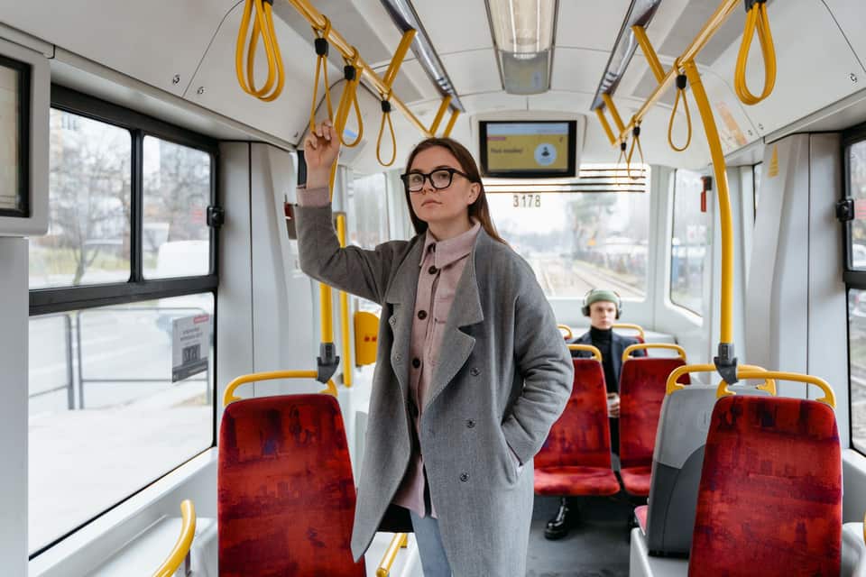 Standing on a bus or train